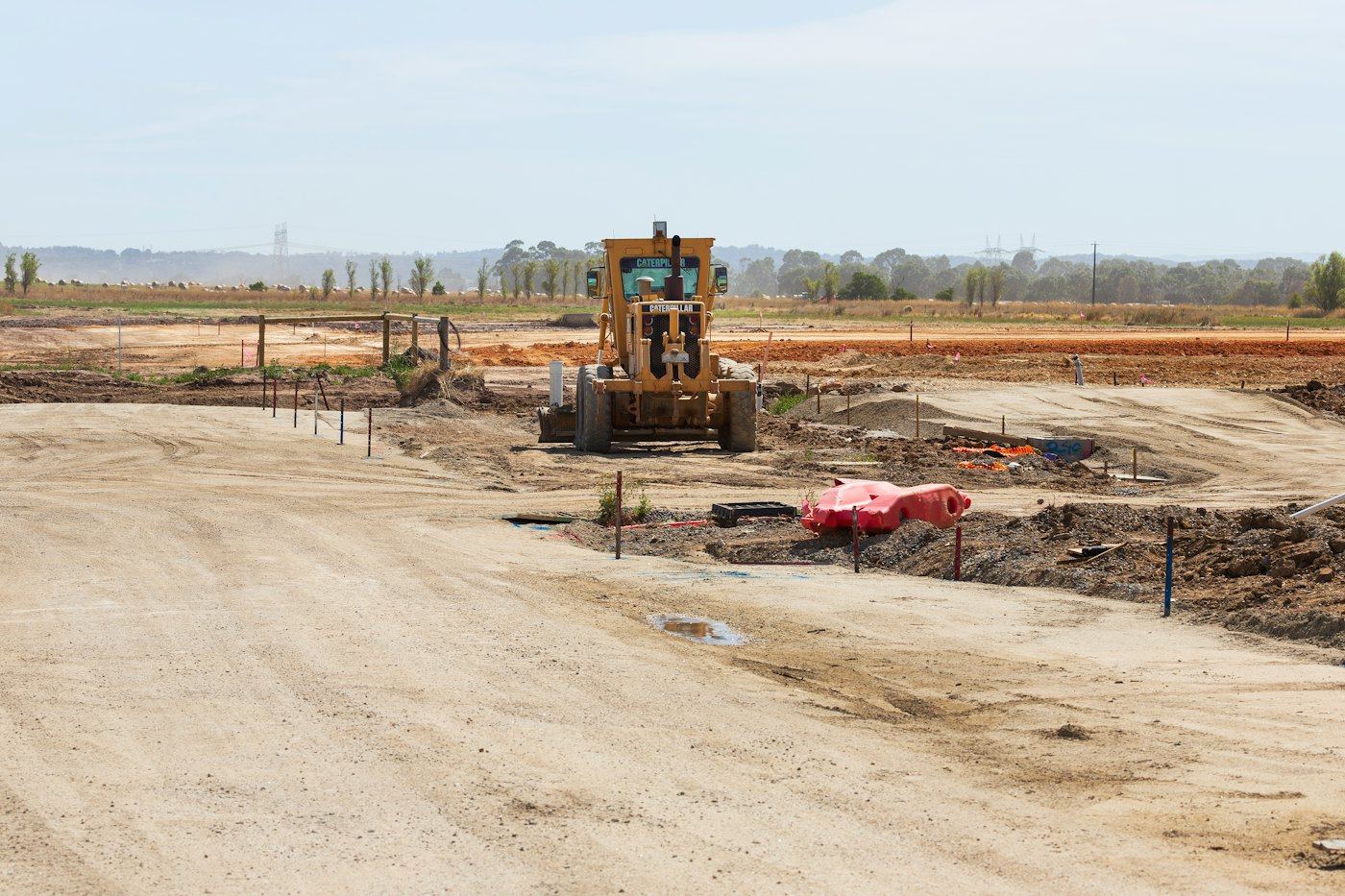Grader working on a residential construction site